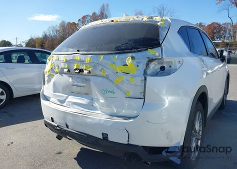 2021 Mazda Cx-5 Grand Touring z USA, uszkodzony, nr VIN JM3KFBDMXM0468606